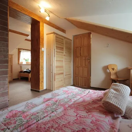 Quarto em Acomodações Particulares Pokoje Goscinne Bulcyk *