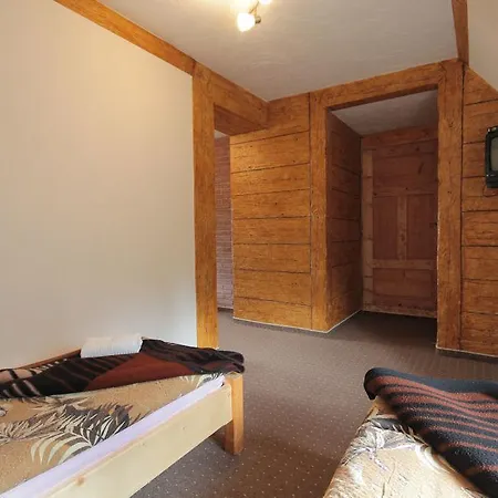 Quarto em Acomodações Particulares Pokoje Goscinne Bulcyk *