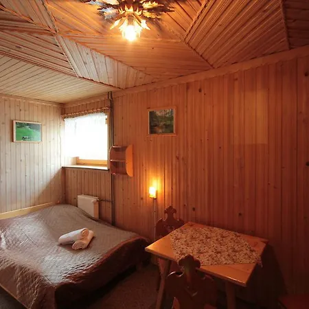 Quarto em Acomodações Particulares Pokoje Goscinne Bulcyk *
