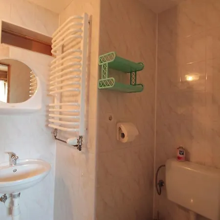Quarto em Acomodações Particulares Pokoje Goscinne Bulcyk *